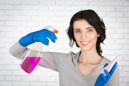 Technician inspecting carpet for stains